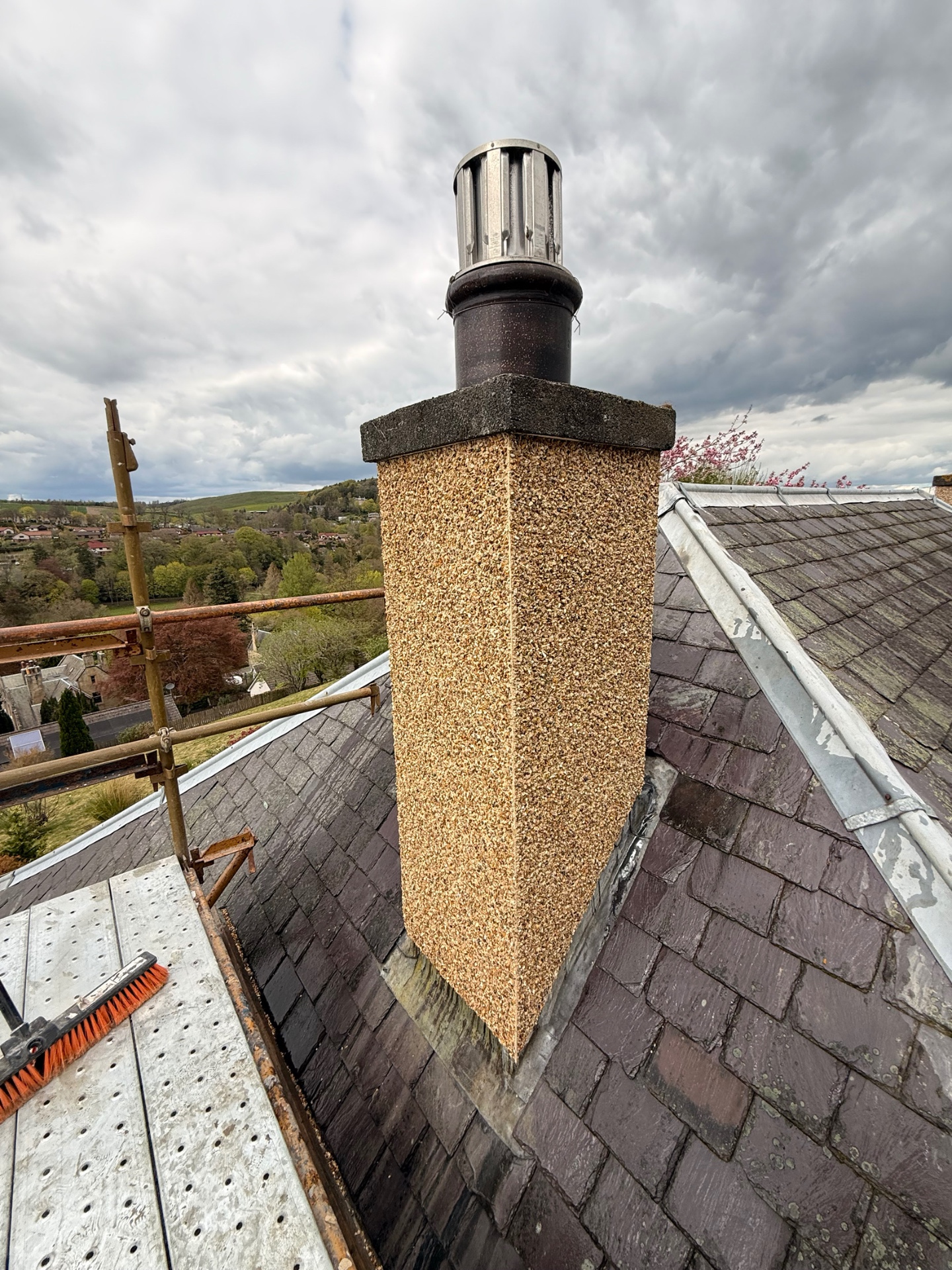 Roughcast chimney stack with scenic view